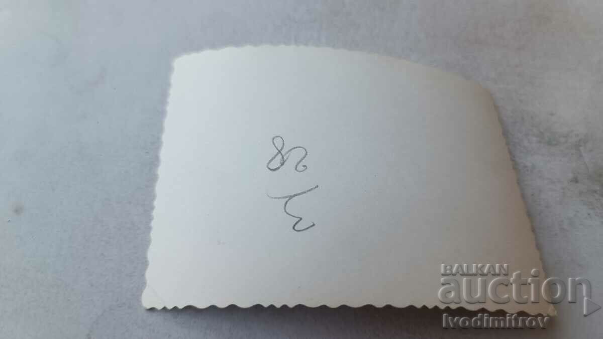 Photo Young men on the beach with price 2.45 BGN | € 1.25