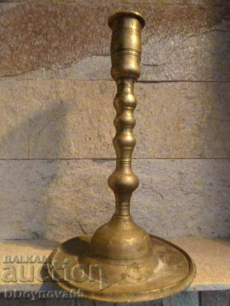 Delivery of Old bronze church candlestick Delivery of Old bronze church candlestick