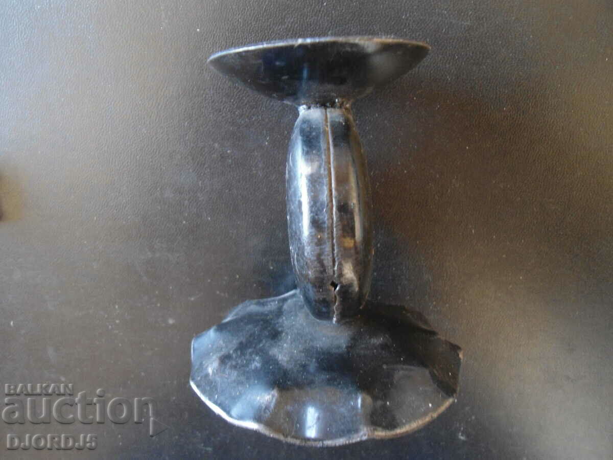 Auction Old forged metal candlestick Auction Old forged metal candlestick