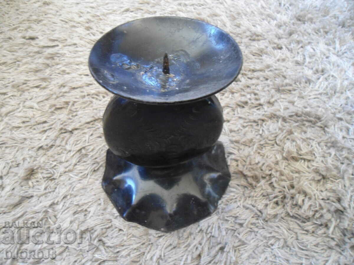 Delivery of Old forged metal candlestick Delivery of Old forged metal candlestick