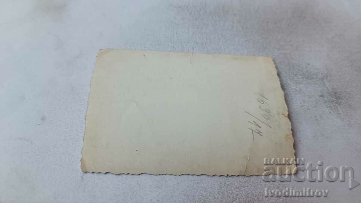 Photo Sofia Two men and a woman in winter coats on a walk with price 2.35 BGN | € 1.20 Photo Sofia Two men and a woman in winter coats on a walk with price 2.35 BGN | € 1.20