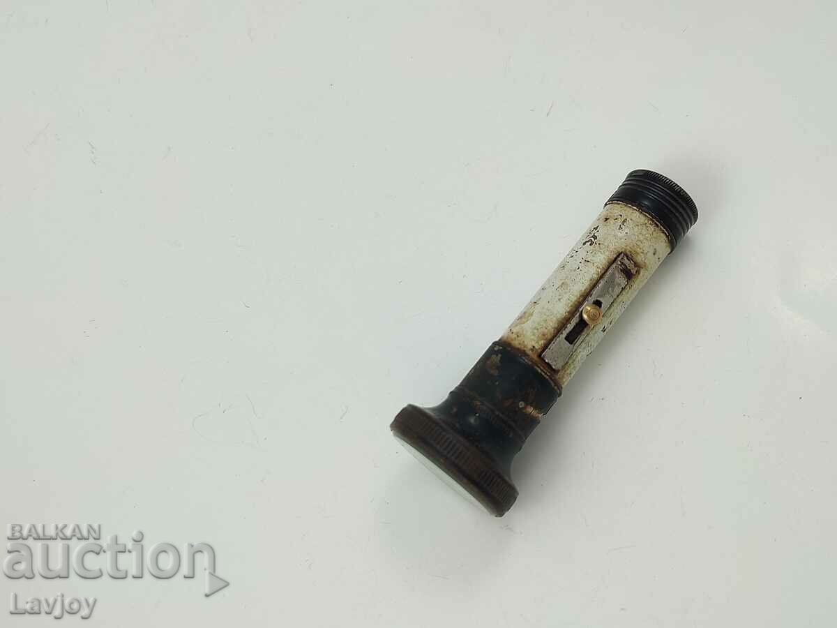 Auction  A small WW1 era pocket flashlight