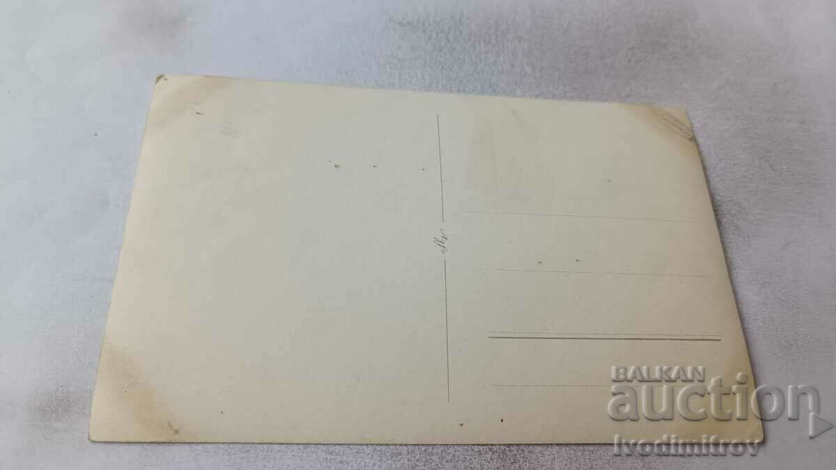 Photo Man, woman and two children in front of a country house with price 1.85 BGN | € 0.95 Photo Man, woman and two children in front of a country house with price 1.85 BGN | € 0.95