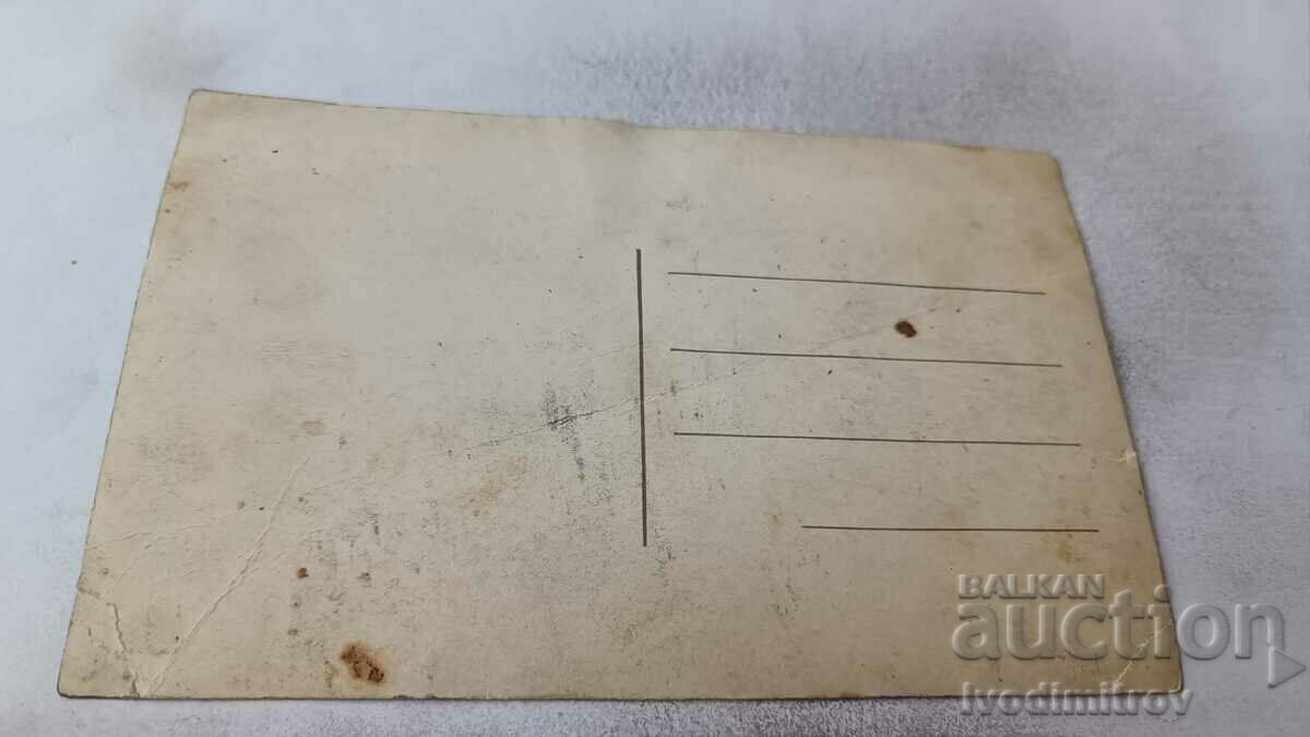 Photo Four young men playing cards in a meadow with price 1.85 BGN | € 0.95