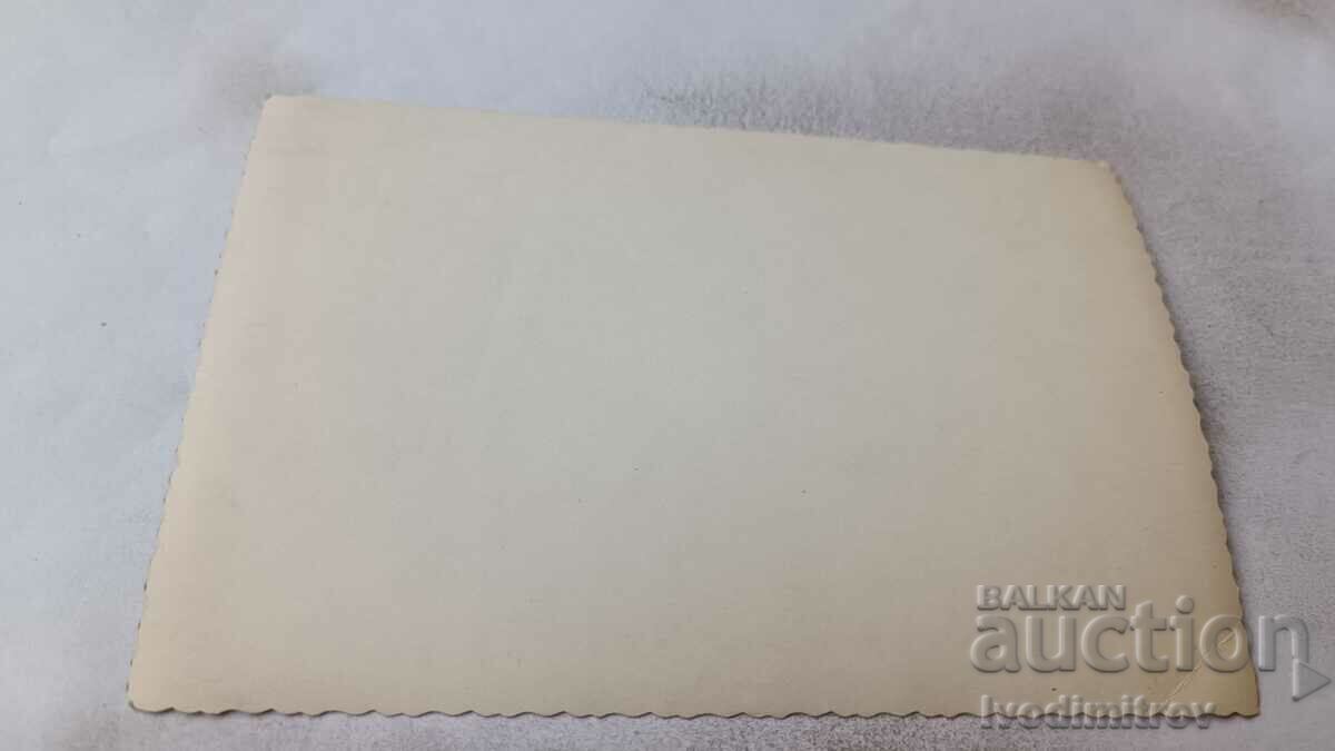 Снимка Рибари в лодка с уловен калкан с цена 2.35 лв. | € 1.20 Снимка Рибари в лодка с уловен калкан с цена 2.35 лв. | € 1.20