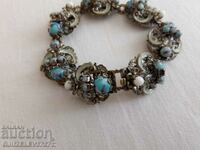 Old lady's bracelet with turquoise glasses