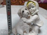 Figurine of a girl with a dog