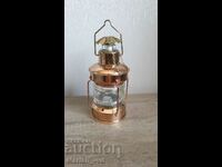 Glass alcohol bottle with lantern