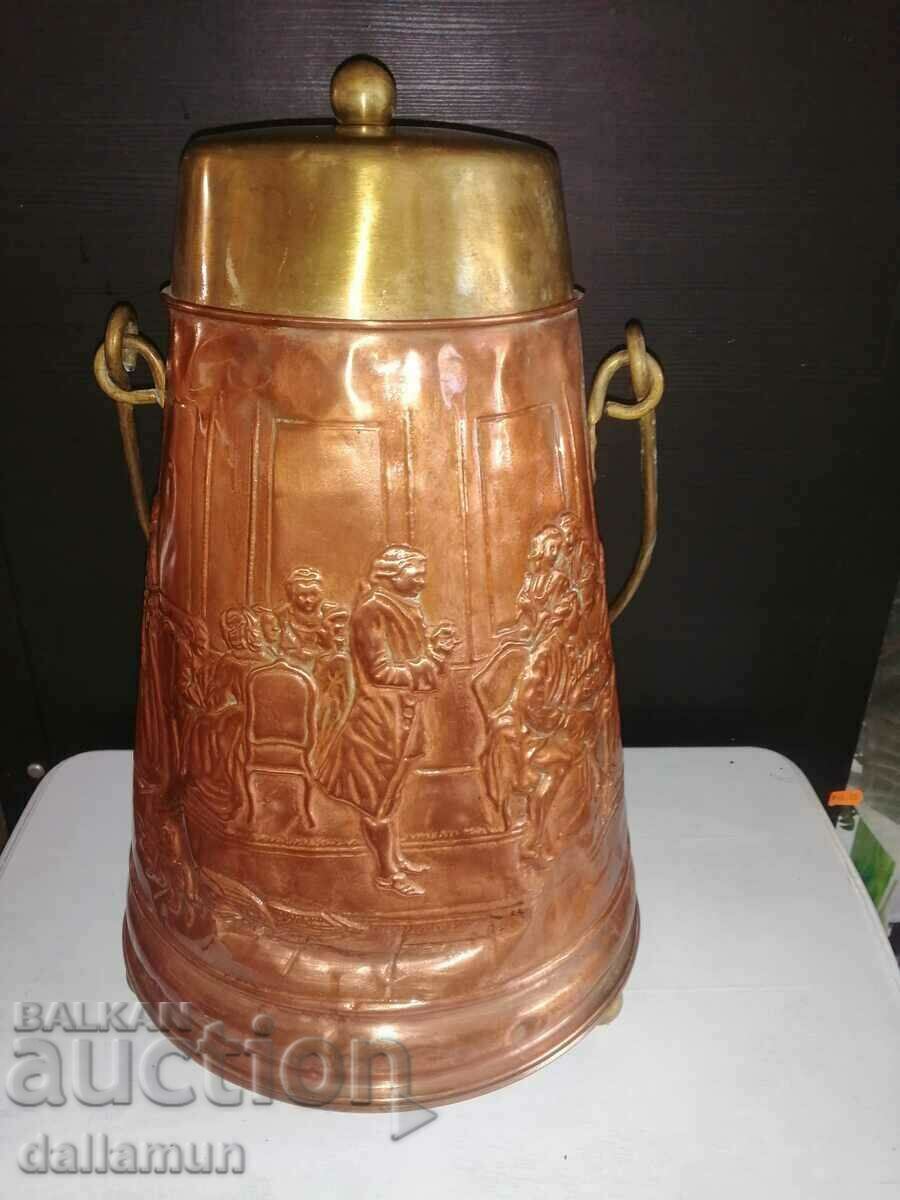 Old copper pot with engraved lid