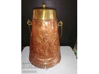 Old copper pot with engraved lid