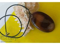 Pendant, necklace of polished natural large agate