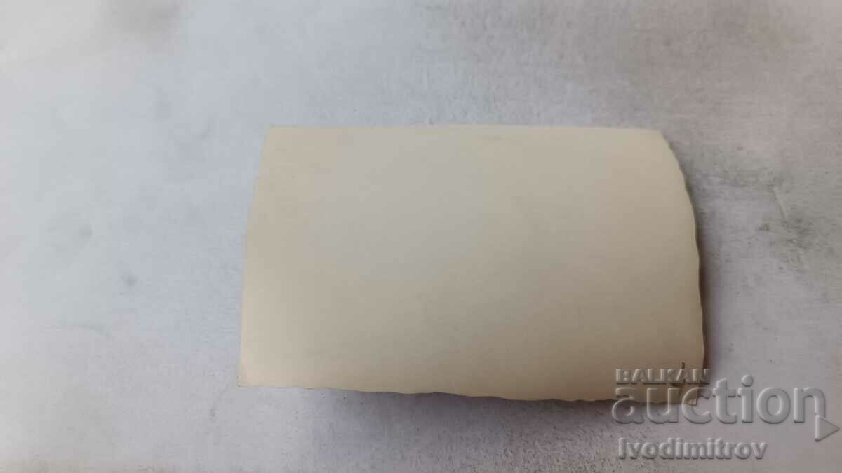 Photo Two men and two women on the street with price 1.65 BGN | € 0.84