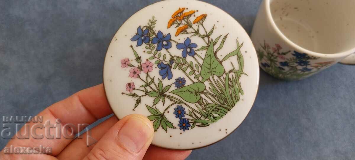 Auction Teacup with strainer Auction Teacup with strainer