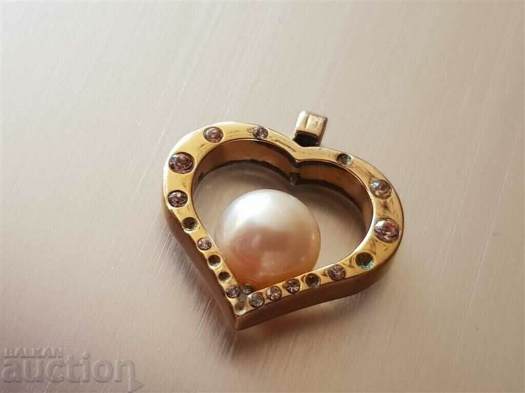Beautiful and romantic silver locket with gilding and pearl with price 20.00 BGN | € 10.23 Beautiful and romantic silver locket with gilding and pearl with price 20.00 BGN | € 10.23