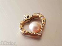 Beautiful and romantic silver locket with gilding and pearl
