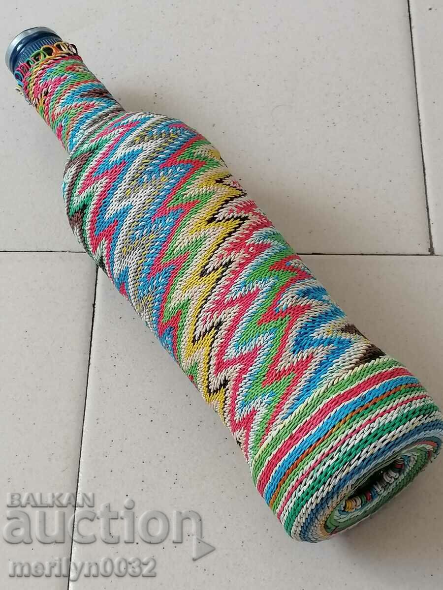 Old glass bottle with colorful braid bottle, glass with price 54.00 BGN | € 27.61 Old glass bottle with colorful braid bottle, glass with price 54.00 BGN | € 27.61