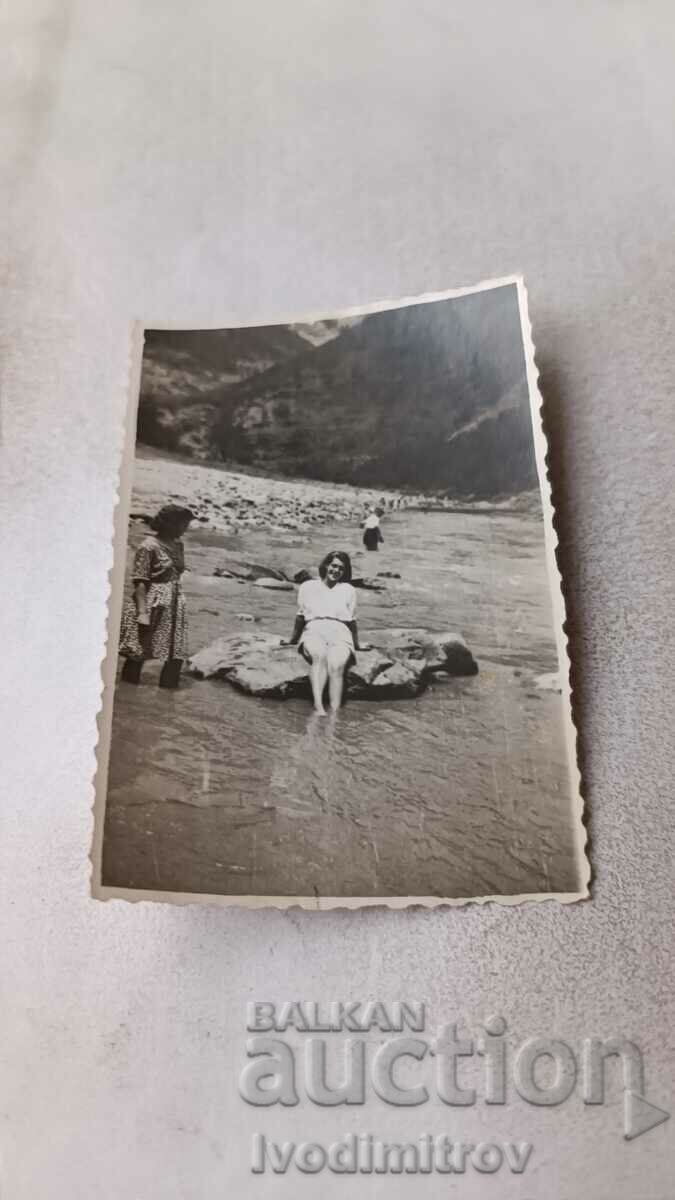 Picture Two young girls in the river