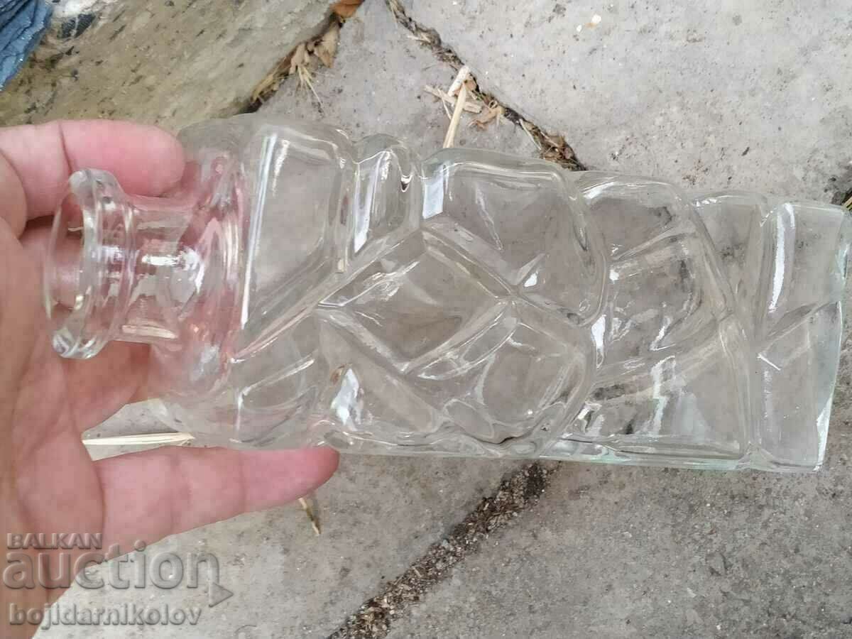 Embossed glass bottle with stopper