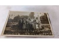 Photo Women and two boys in the park 1930