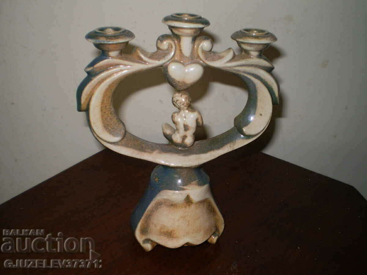 Auction Retro candlestick with a child figurine, colored ceramics Auction Retro candlestick with a child figurine, colored ceramics