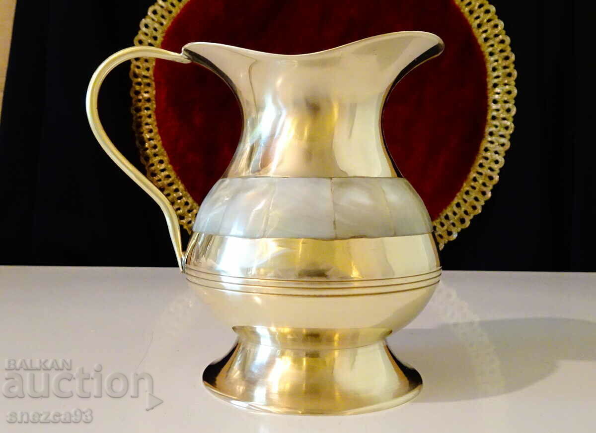 Auction  Bronze wine jug, natural mother-of-pearl