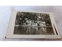 Photo Varna Young men and women by a lake in the park 1928