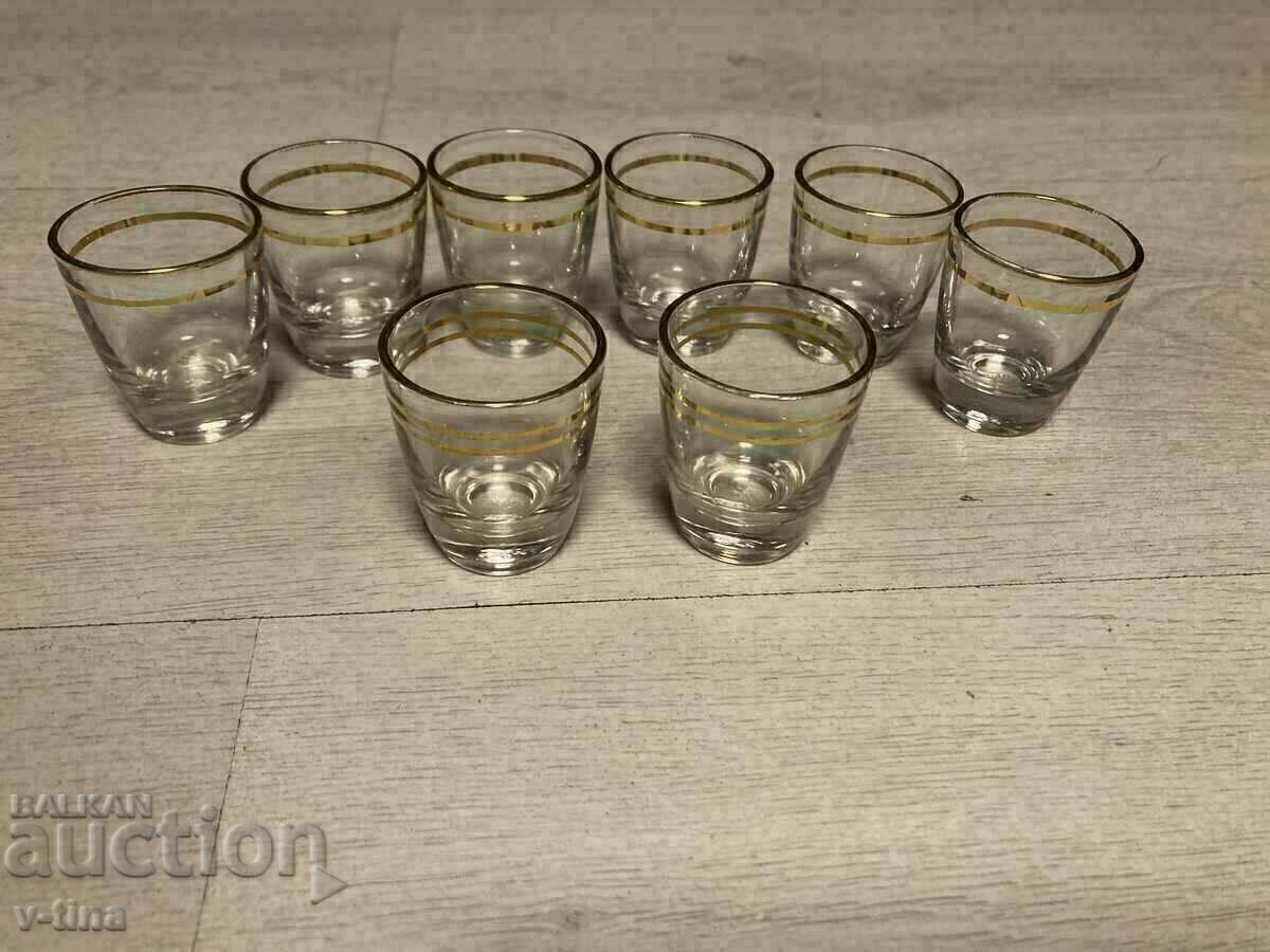 Set of old glass brandy glasses with gilding