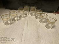 Set of old glass brandy glasses with gilding