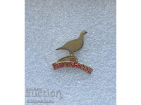 badge Scotch Whiskey the Famous Grouse
