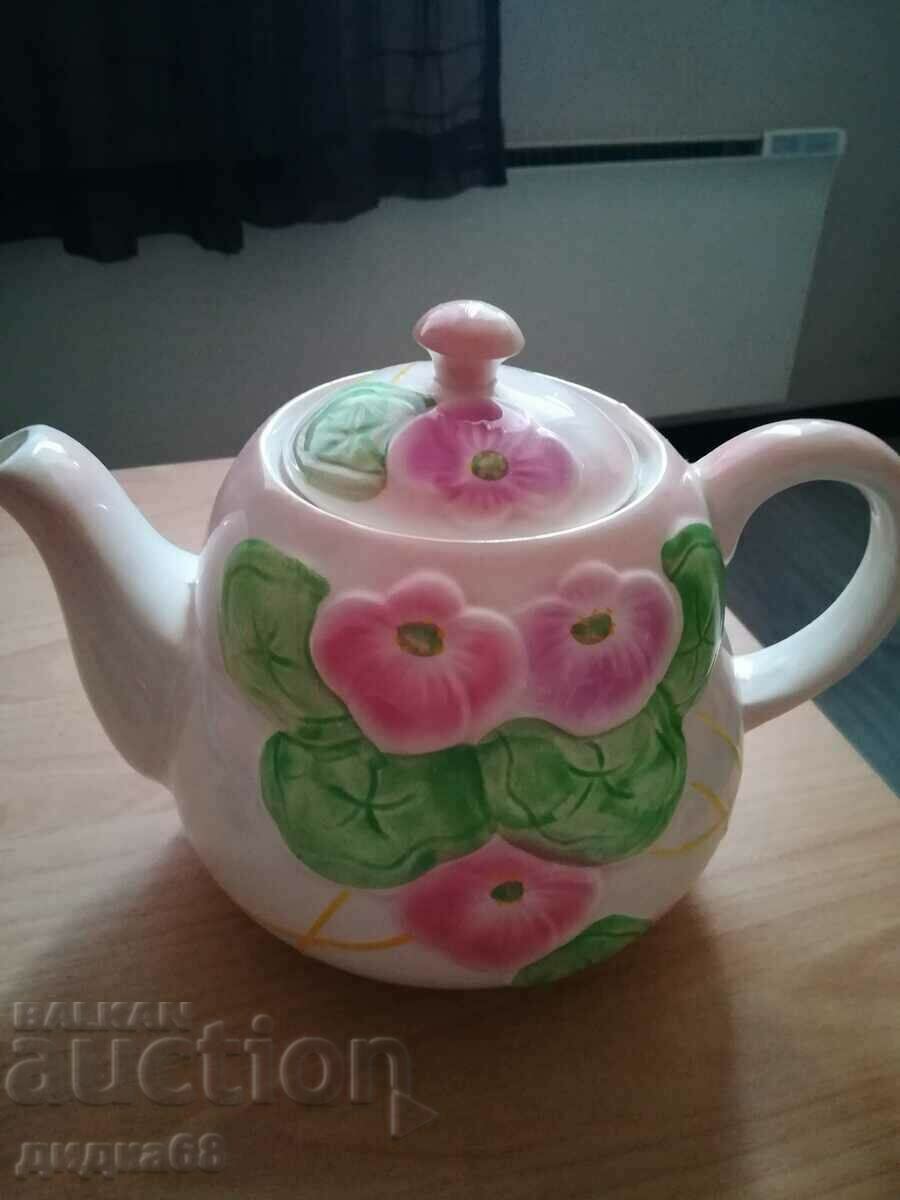 A beautiful embossed England porcelain teapot