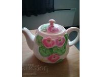 A beautiful embossed England porcelain teapot