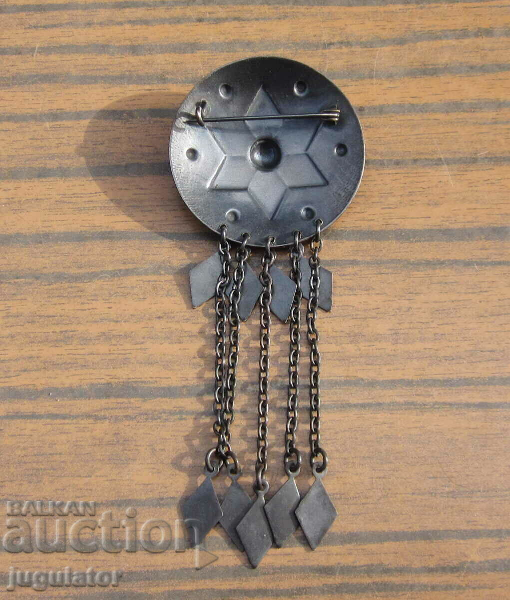 Delivery of old Bulgarian ethnographic folk jewelry is twinkling with a needle Delivery of old Bulgarian ethnographic folk jewelry is twinkling with a needle