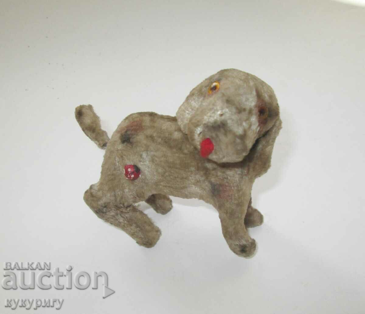 Old children's plush mechanical toy dog