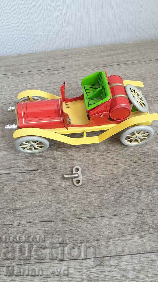 Доставка на Механична ламаринена играчка Доставка на Механична ламаринена играчка