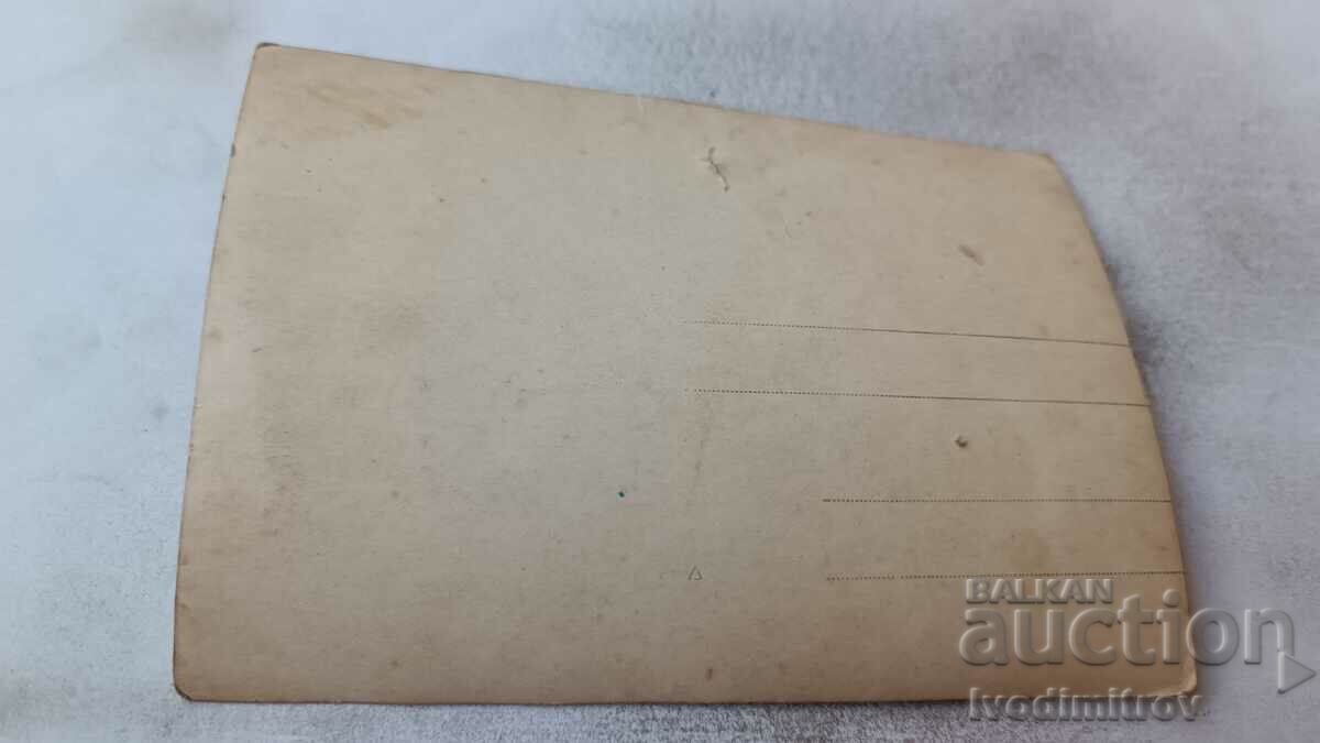 Photo Women and a boy holding a small puppy in their hands with price 2.35 BGN | € 1.20 Photo Women and a boy holding a small puppy in their hands with price 2.35 BGN | € 1.20