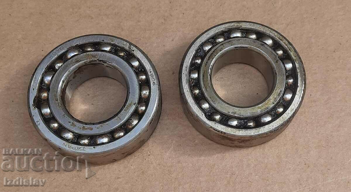 Two Japanese double-row self-aligning ball bearings. Two Japanese double-row self-aligning ball bearings.