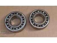 Two Japanese double-row self-aligning ball bearings.