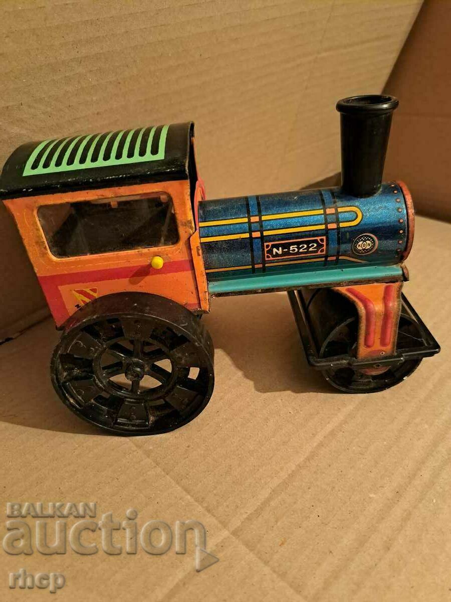 Old Hungarian tin toy roller KDN