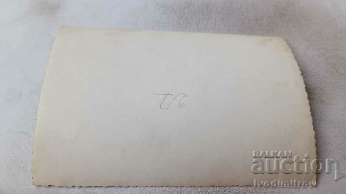 Photo Two men and children with a soccer ball on the field with price 1.65 BGN | € 0.84 Photo Two men and children with a soccer ball on the field with price 1.65 BGN | € 0.84