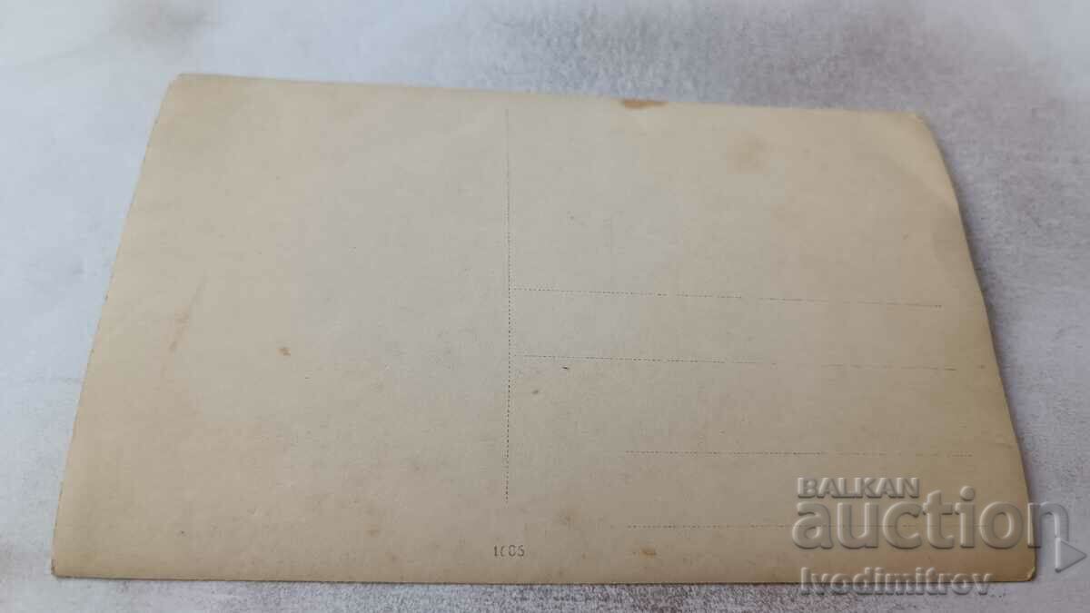 Photo Woman in a black dress with price 1.65 BGN | € 0.84 Photo Woman in a black dress with price 1.65 BGN | € 0.84