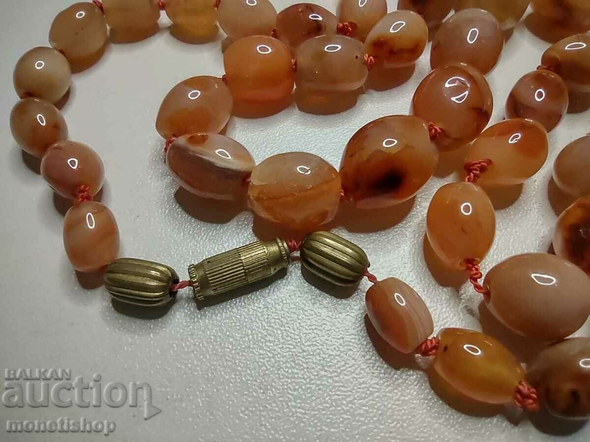 Auction Amber necklace with a length of 88 cm and a weight of 97 g. Auction Amber necklace with a length of 88 cm and a weight of 97 g.