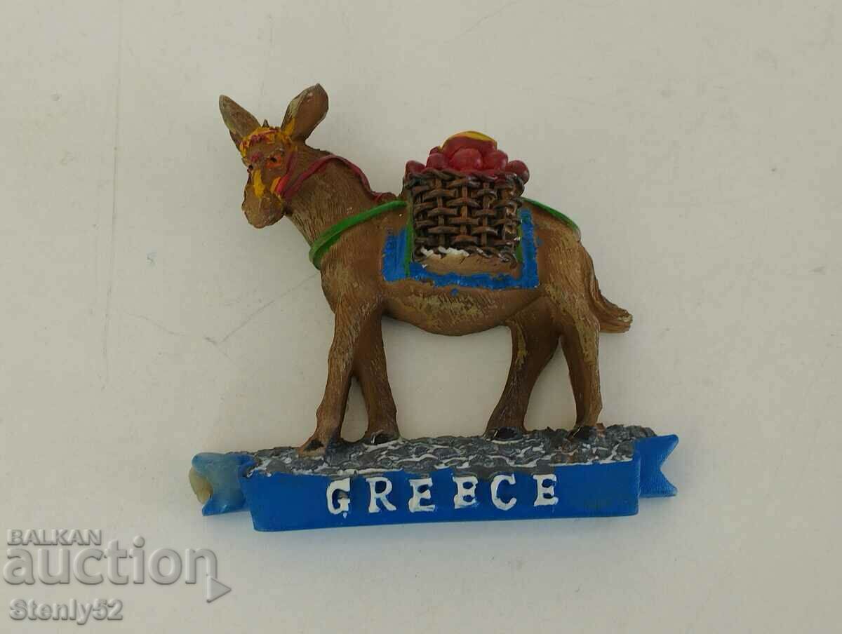 Souvenir donkey with fridge magnet