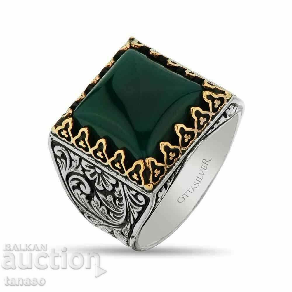 Men's ring with green zircon