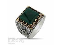 Men's ring with green zircon