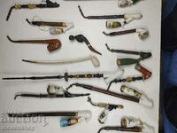 A collection of ceramic pipes