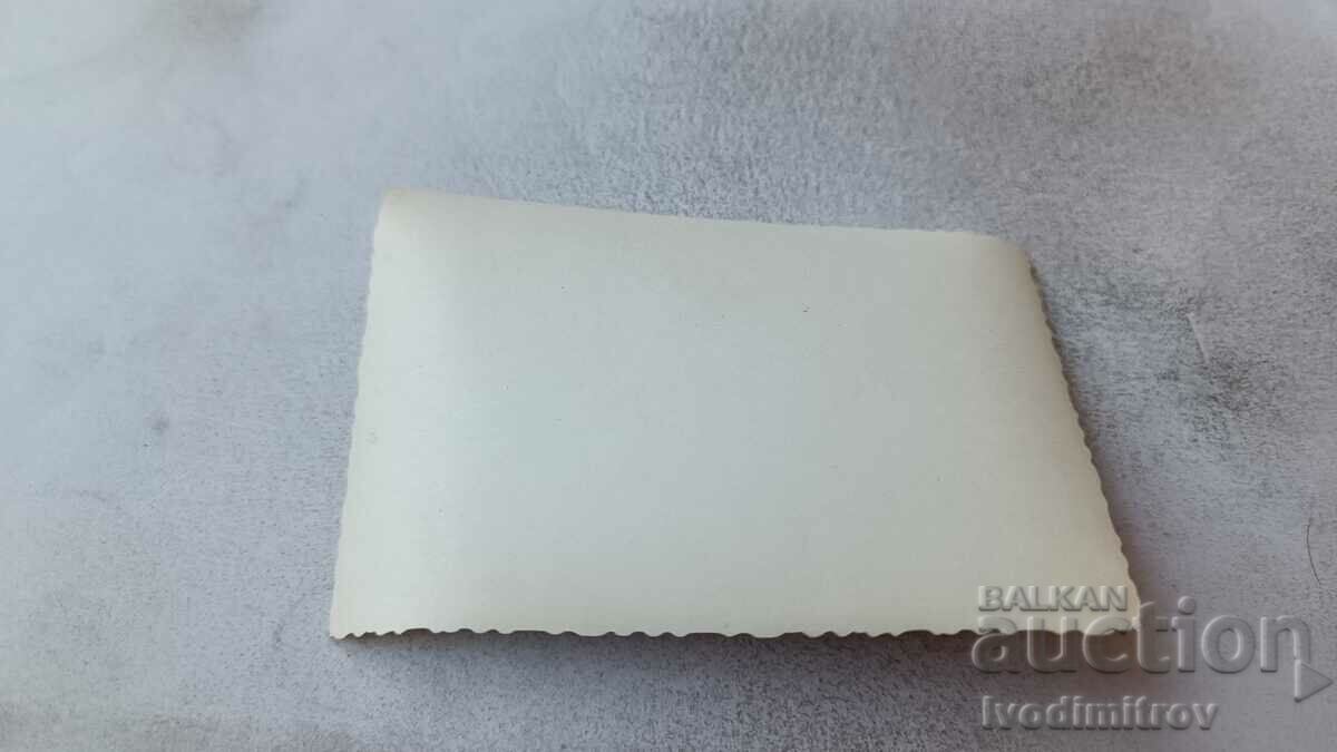 Photo Man, woman and two children on a walk with price 1.75 BGN | € 0.89