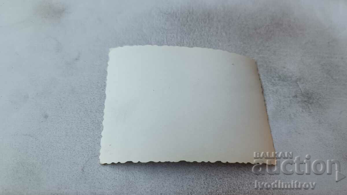 Photo Man and boys on the beach with price 2.35 BGN | € 1.20 Photo Man and boys on the beach with price 2.35 BGN | € 1.20