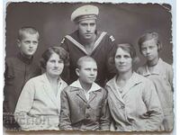 Photograph of a Naval Academy cadet and his family