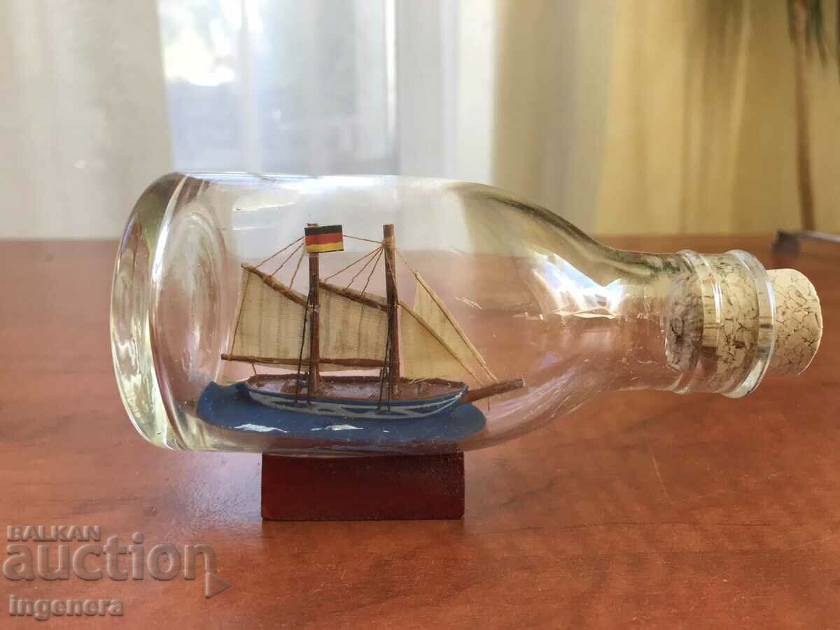 SOUVENIR SHIP MOUNTED IN GLASS BOTTLE STAND UNIQUE