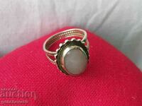 Old pillar ring with white opal/markings